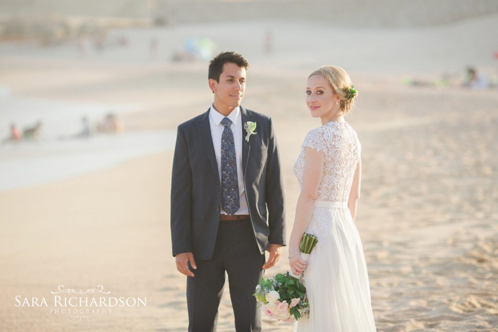 bride & groom during their romantic beach wedding