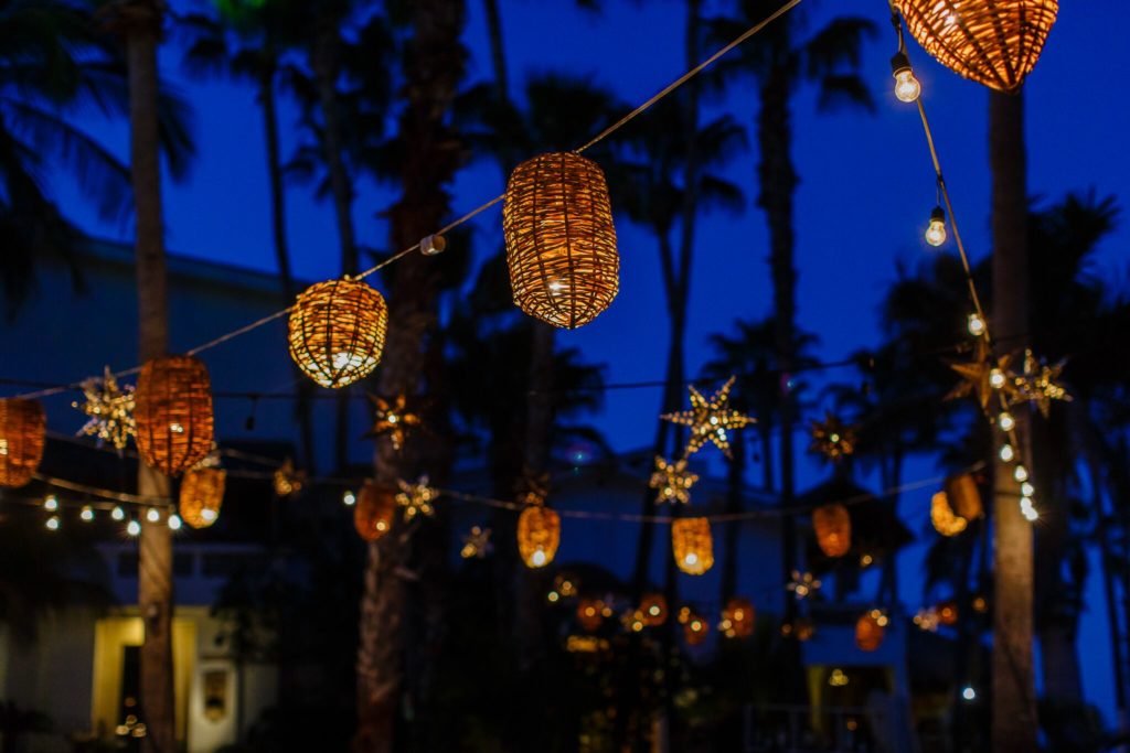glowing hanging lanterns at Cabo beach wedding