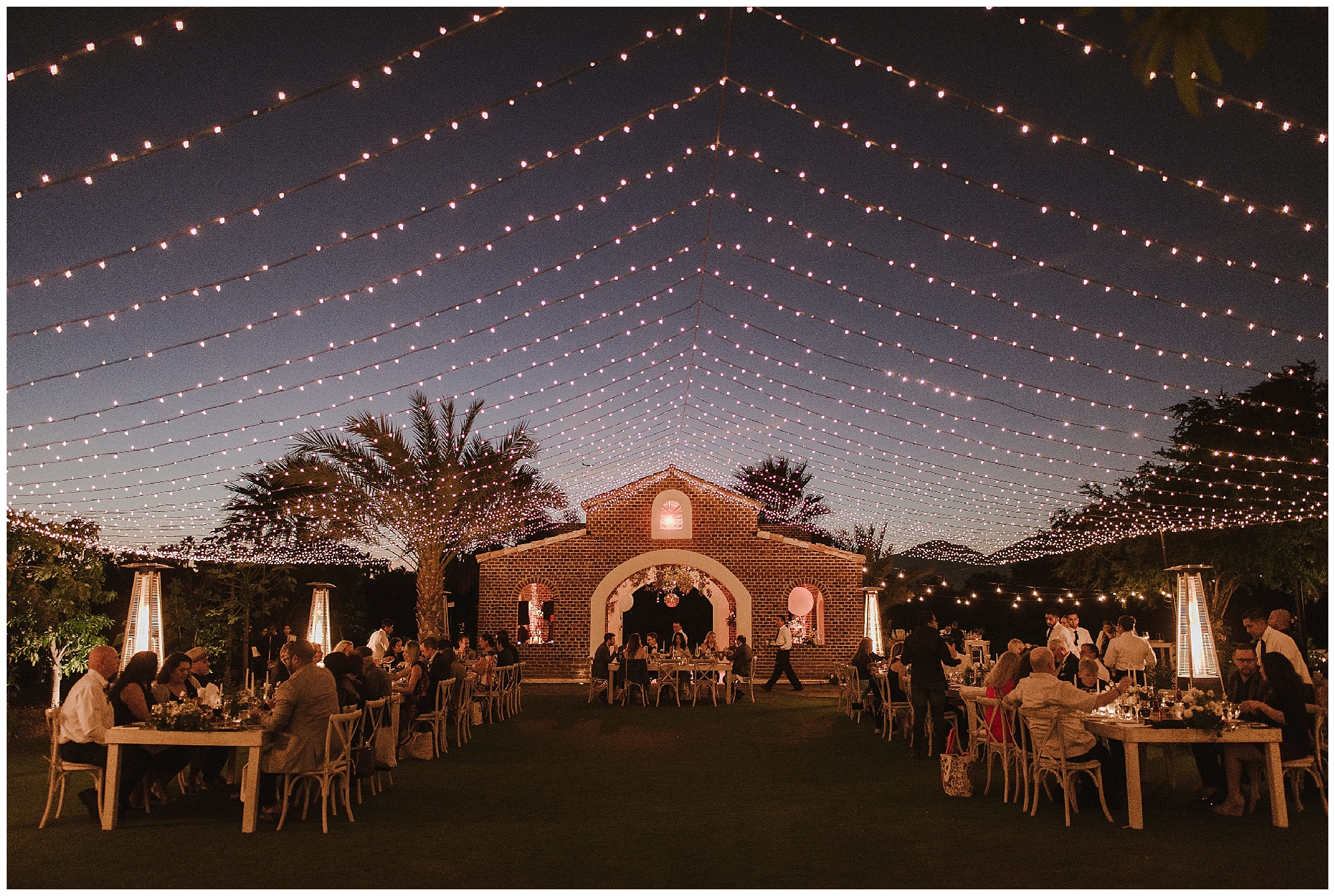 Wow - the lighting looks like stars in the sky - truly a beautiful Cabo wedding celebration