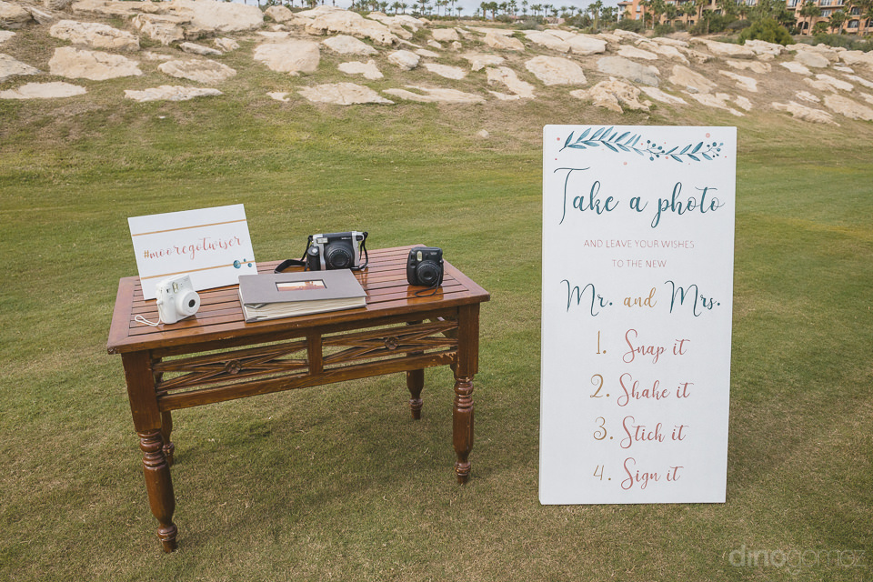 fun Polaroid station set up for Cabo del Sol wedding weekend