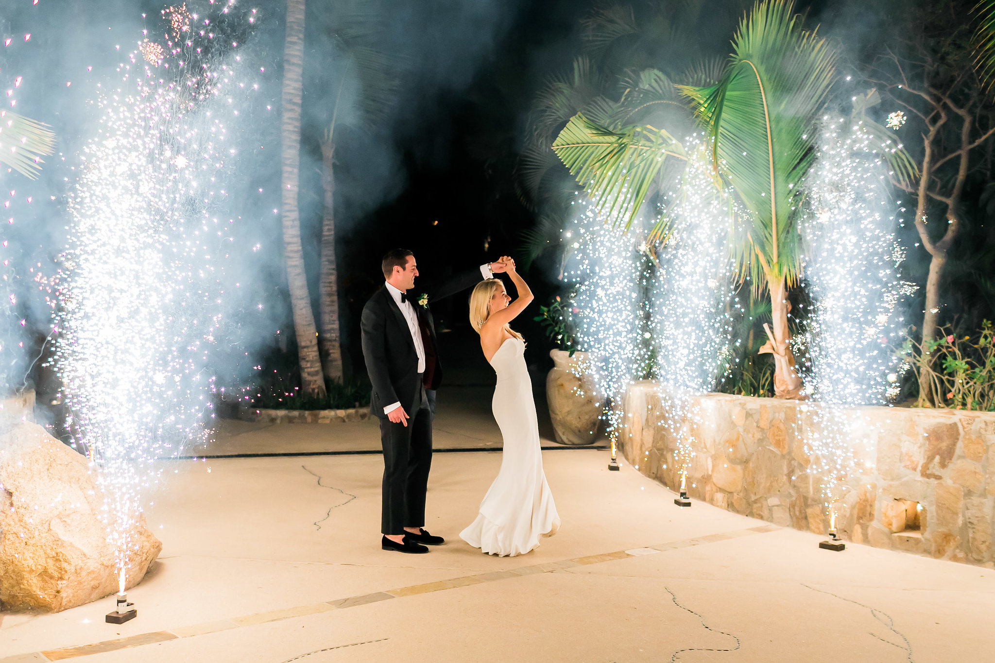 amazing fireworks entrance to reception at White Wedding At The One & Only Palmilla