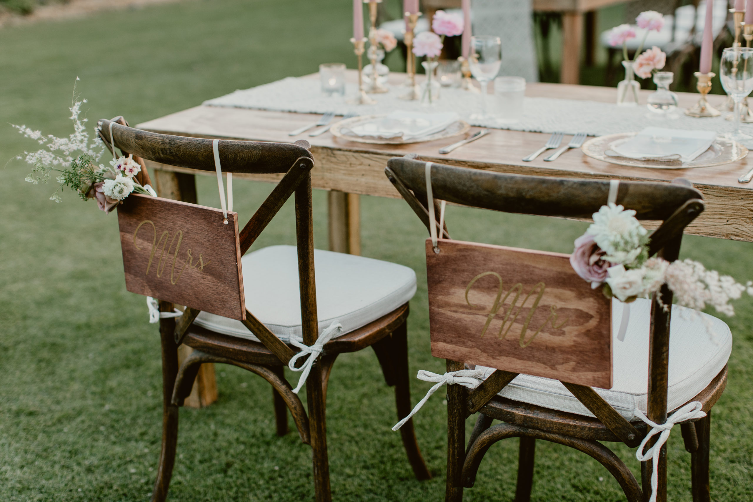 bride & groom seating at June wedding reception at Flora Farms