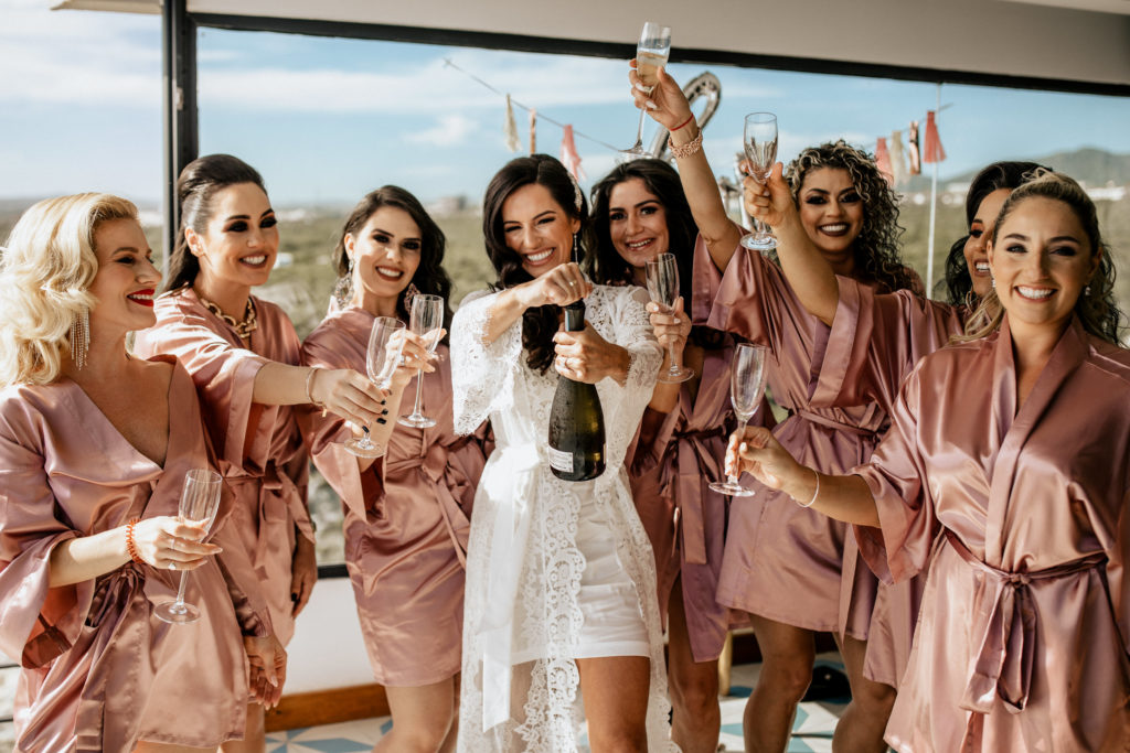 the bridal party getting ready - the funnest part of the wedding day timeline!
