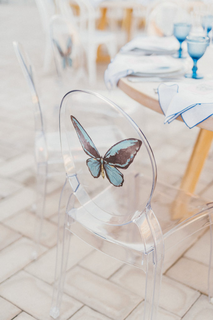 custom wedding accessories in the form of clear chair with a butterfly monogram