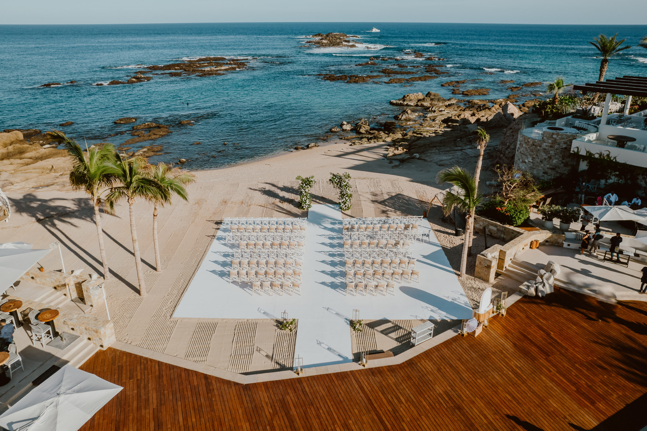 A beach-front ceremony at one of the top Cabo wedding venues - Chileno Bay
