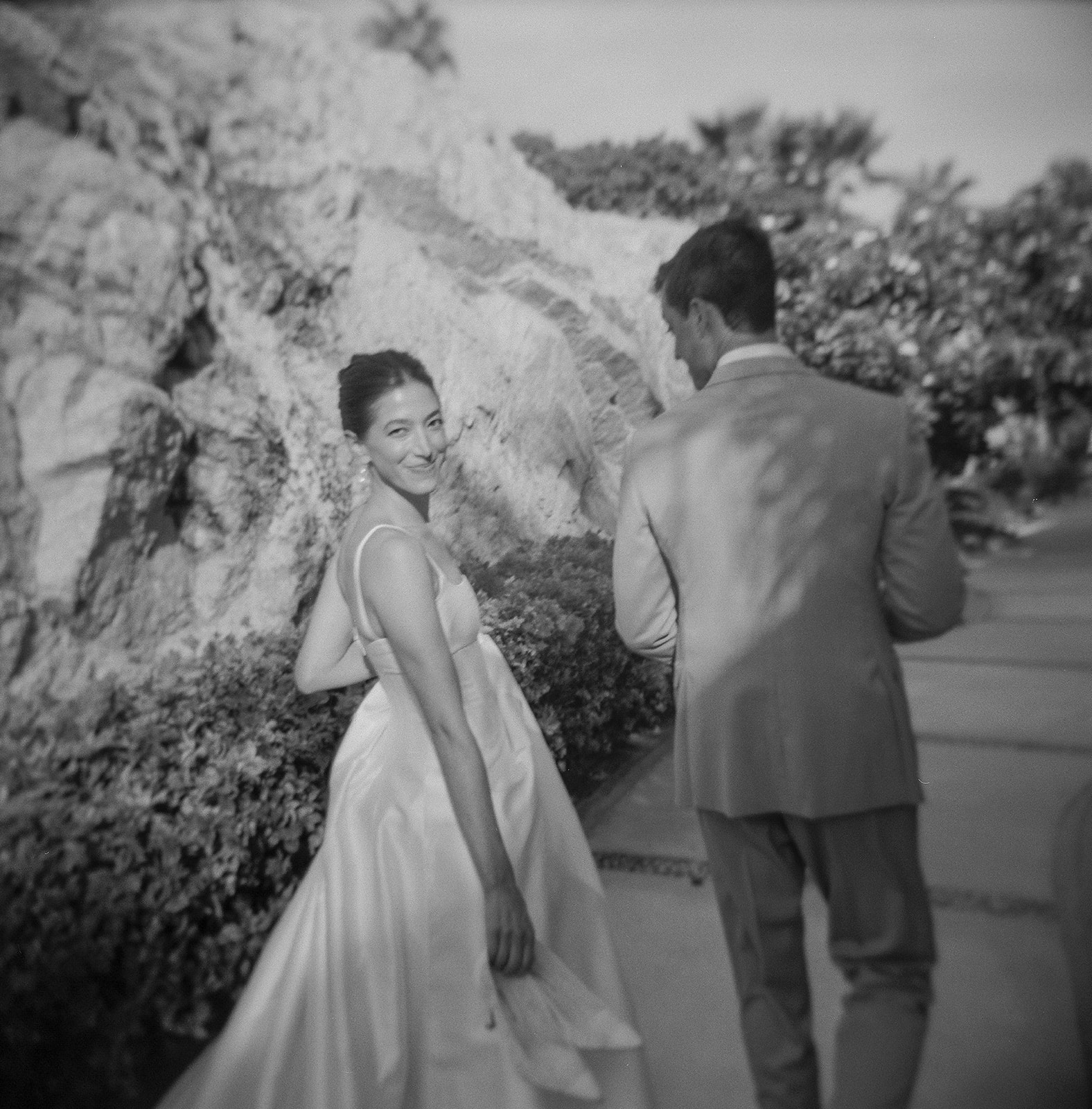 post-wedding ceremony black and white image of bride and groom